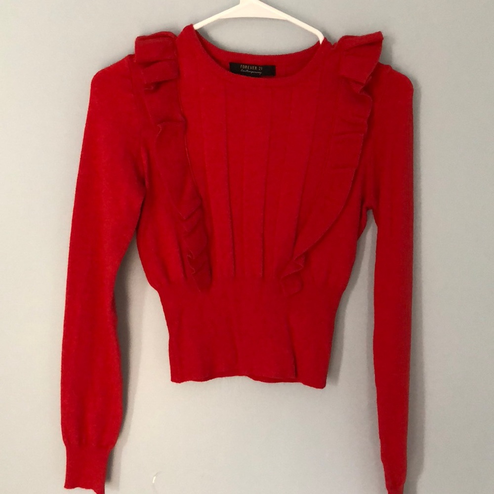 Bright red fitted sweater with ruffles
